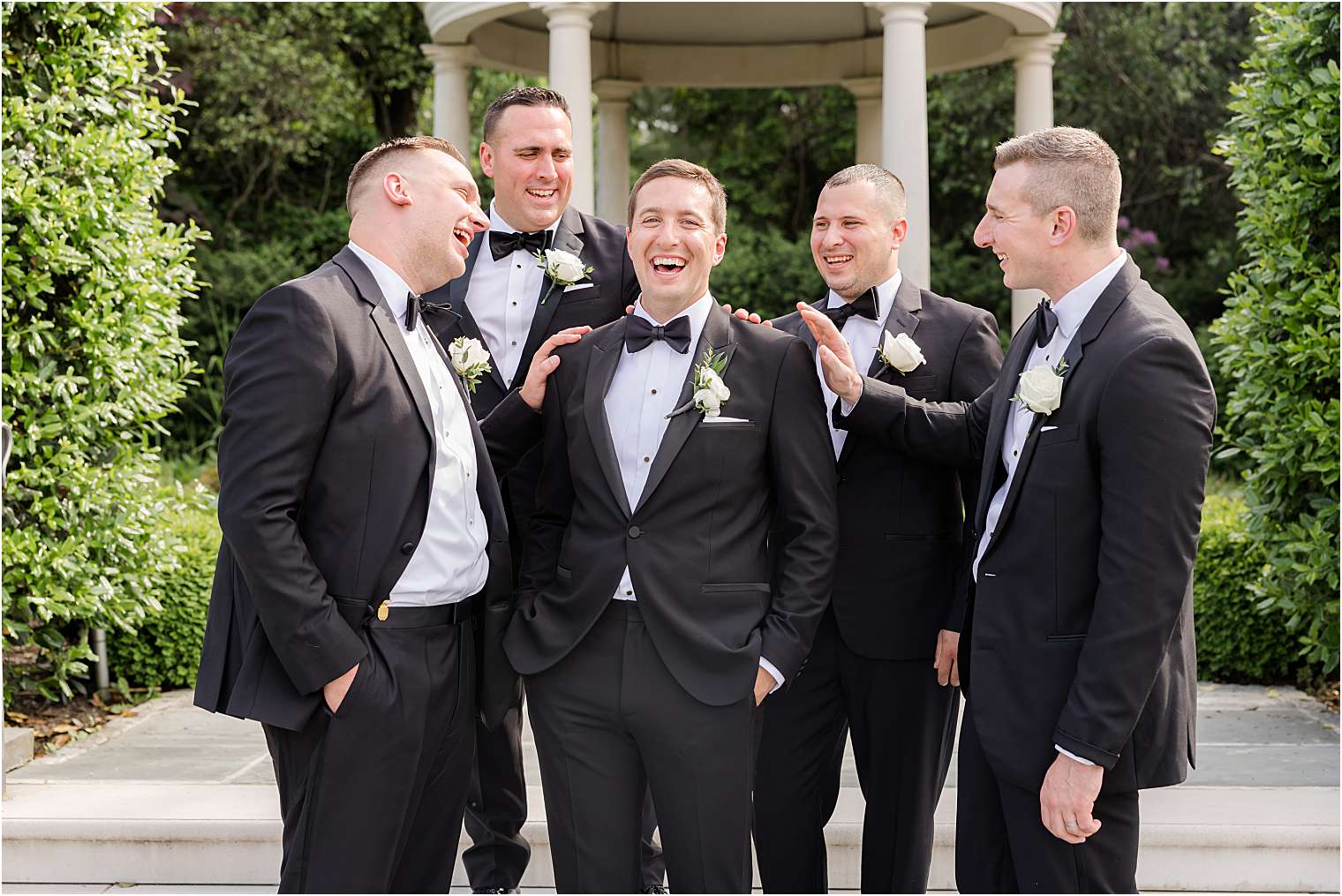 groom walking with his groomsmen