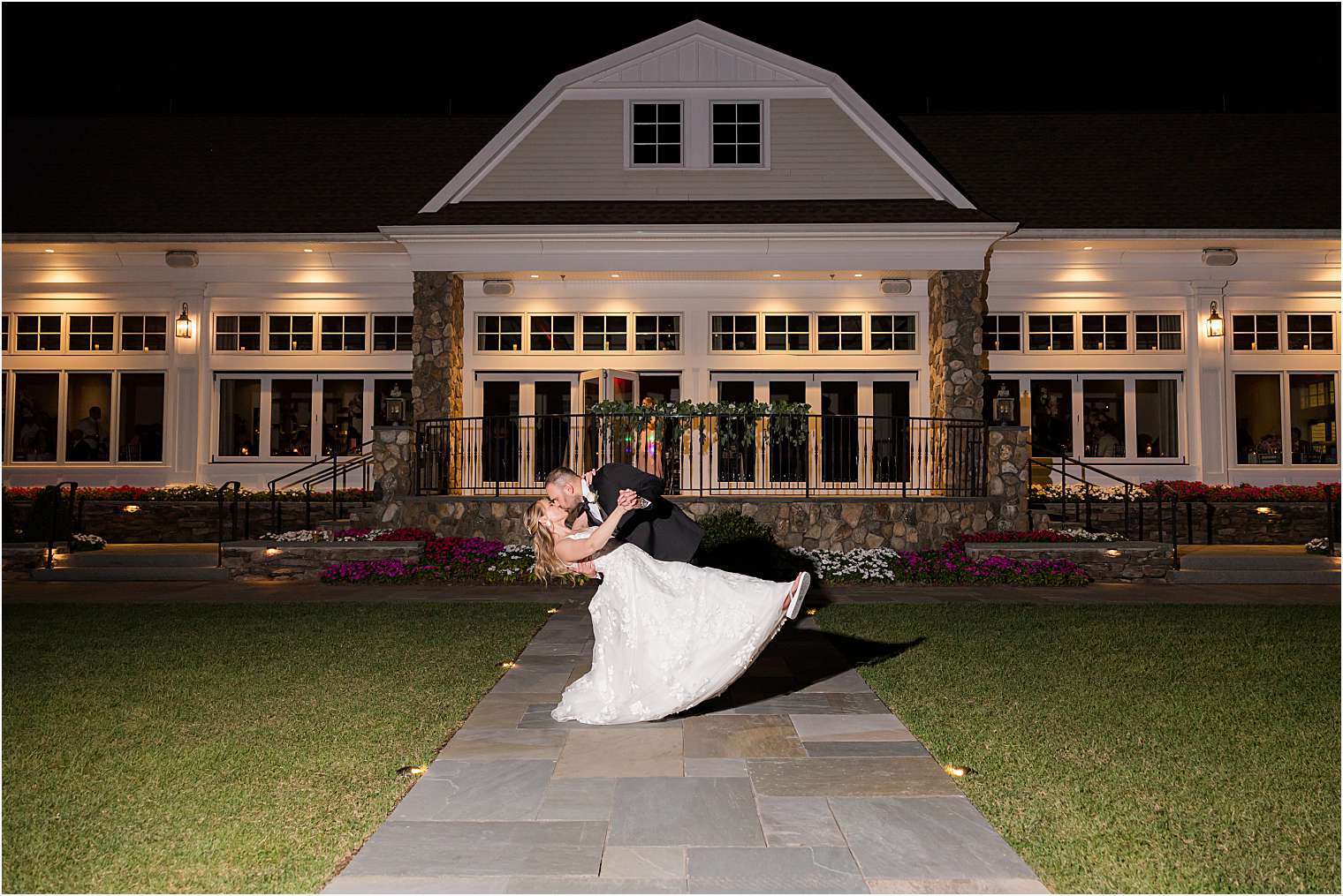 husband and wife sharing a kiss at the end of the night 