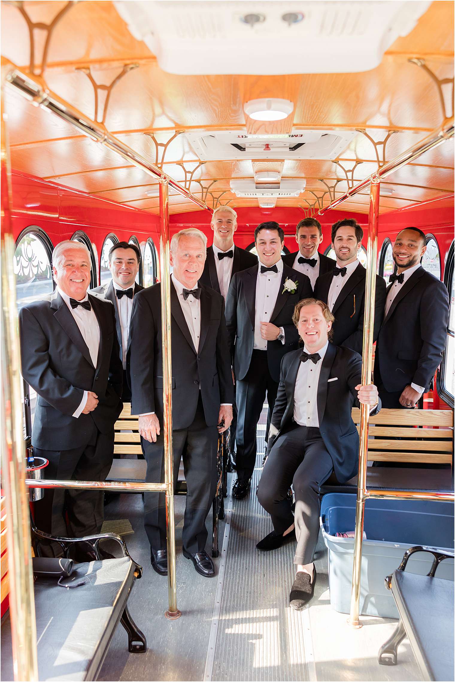 groom with his groomsmen in the trolley