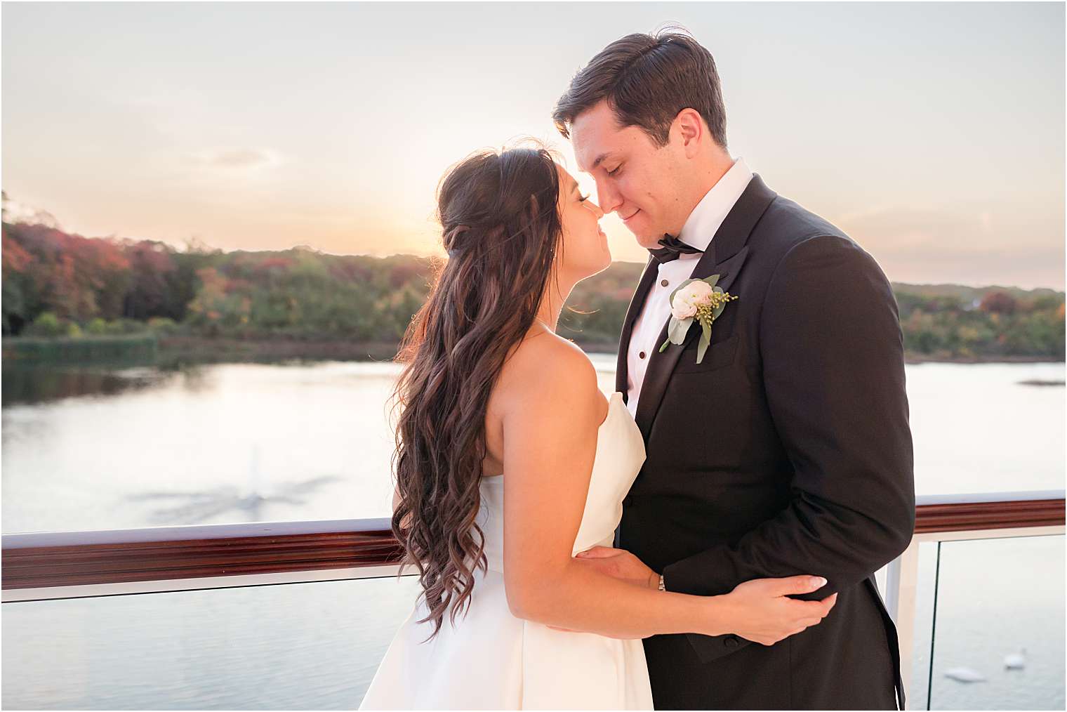 husband and wife enjoying the sunset 