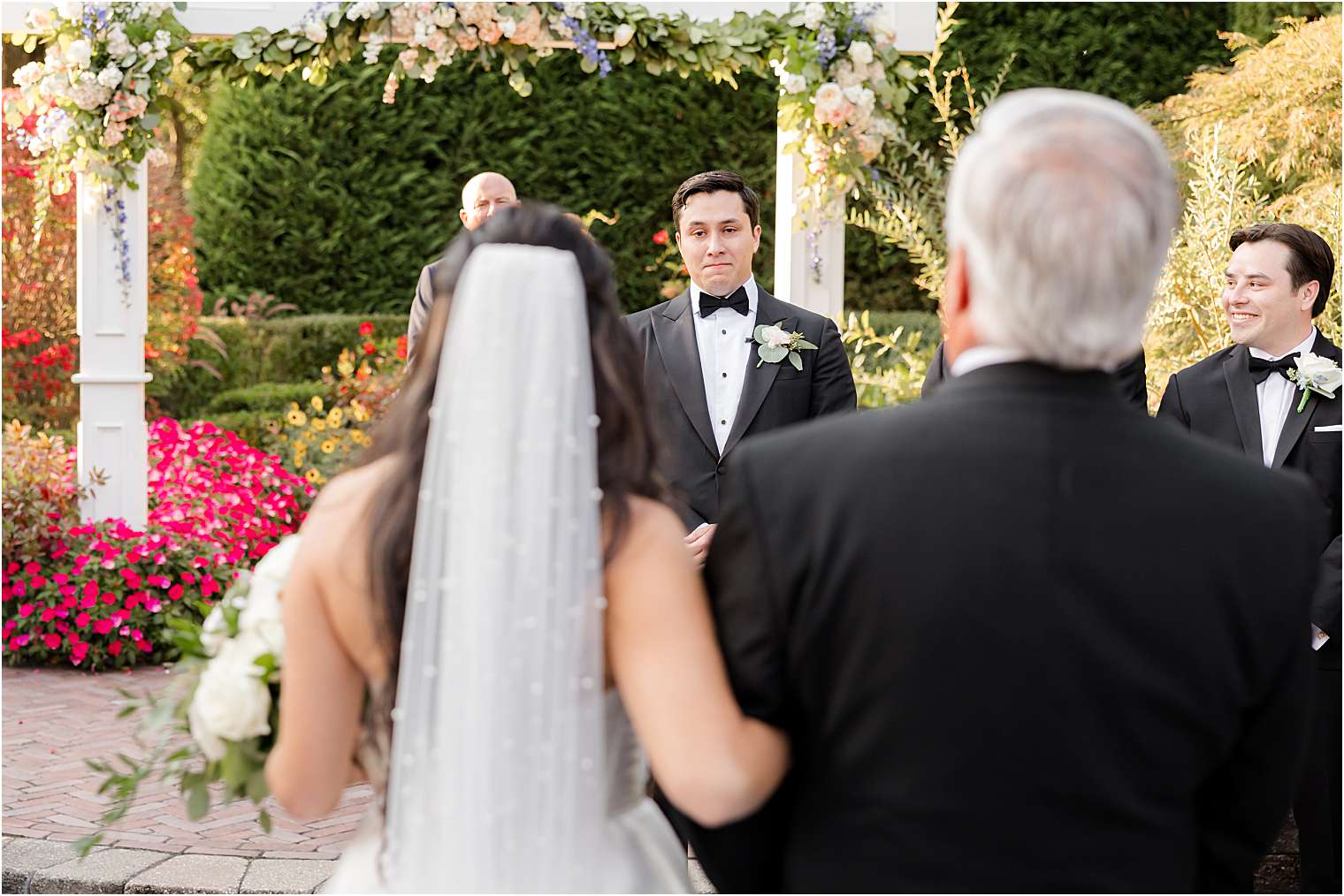 Groom welcoming the bride at the altar