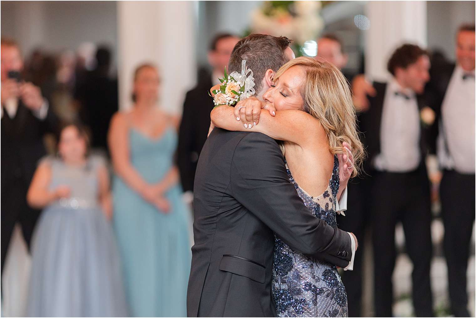 Groom dancing with his mother.