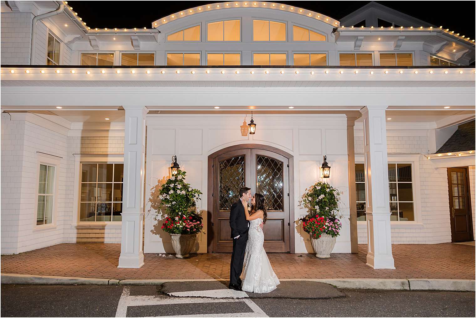 husband and wife sharing a kiss at the end of the night 