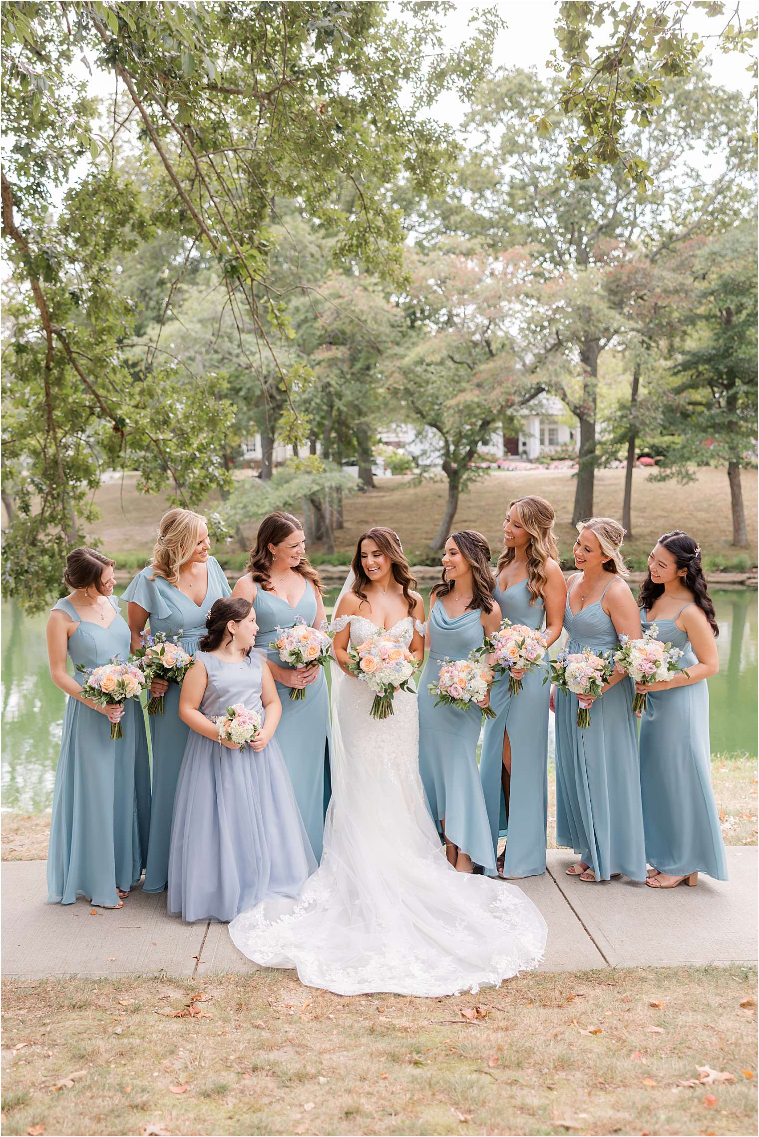 Bride posing with her bridesmaids