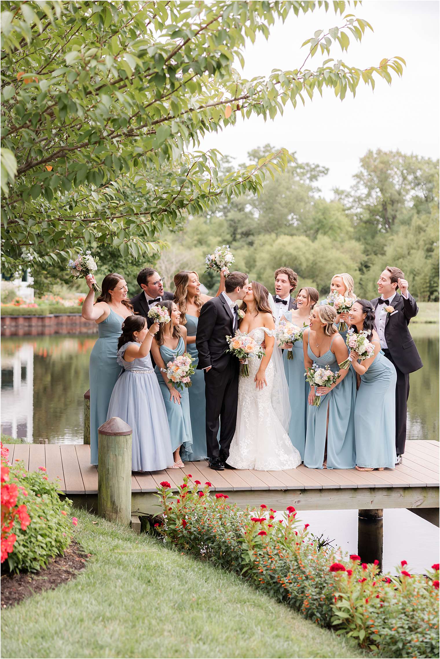 Wife, husband, and family by the lake