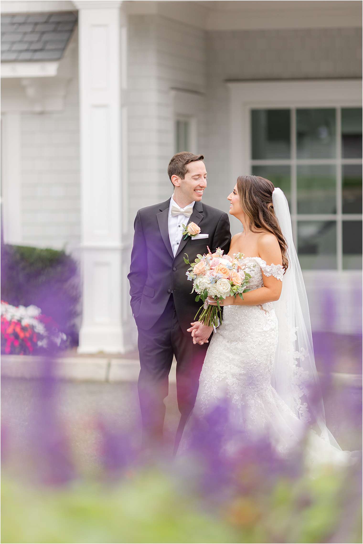 husband and wife walking while they hold their hands 