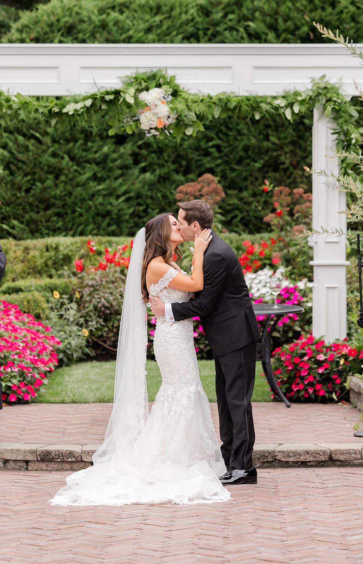 husband and wife kissing