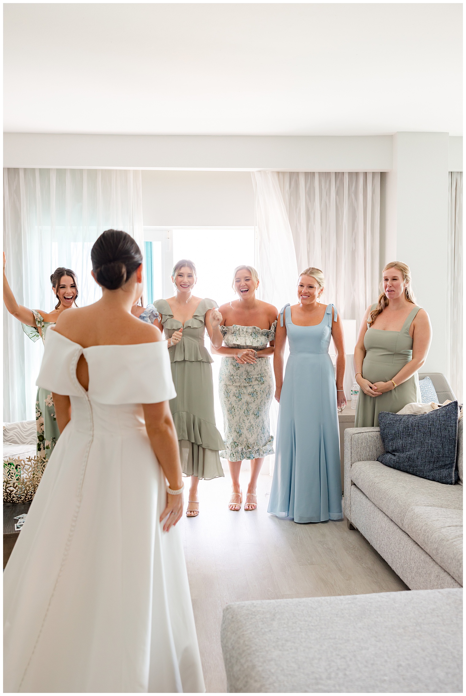 first look with her bridesmaids