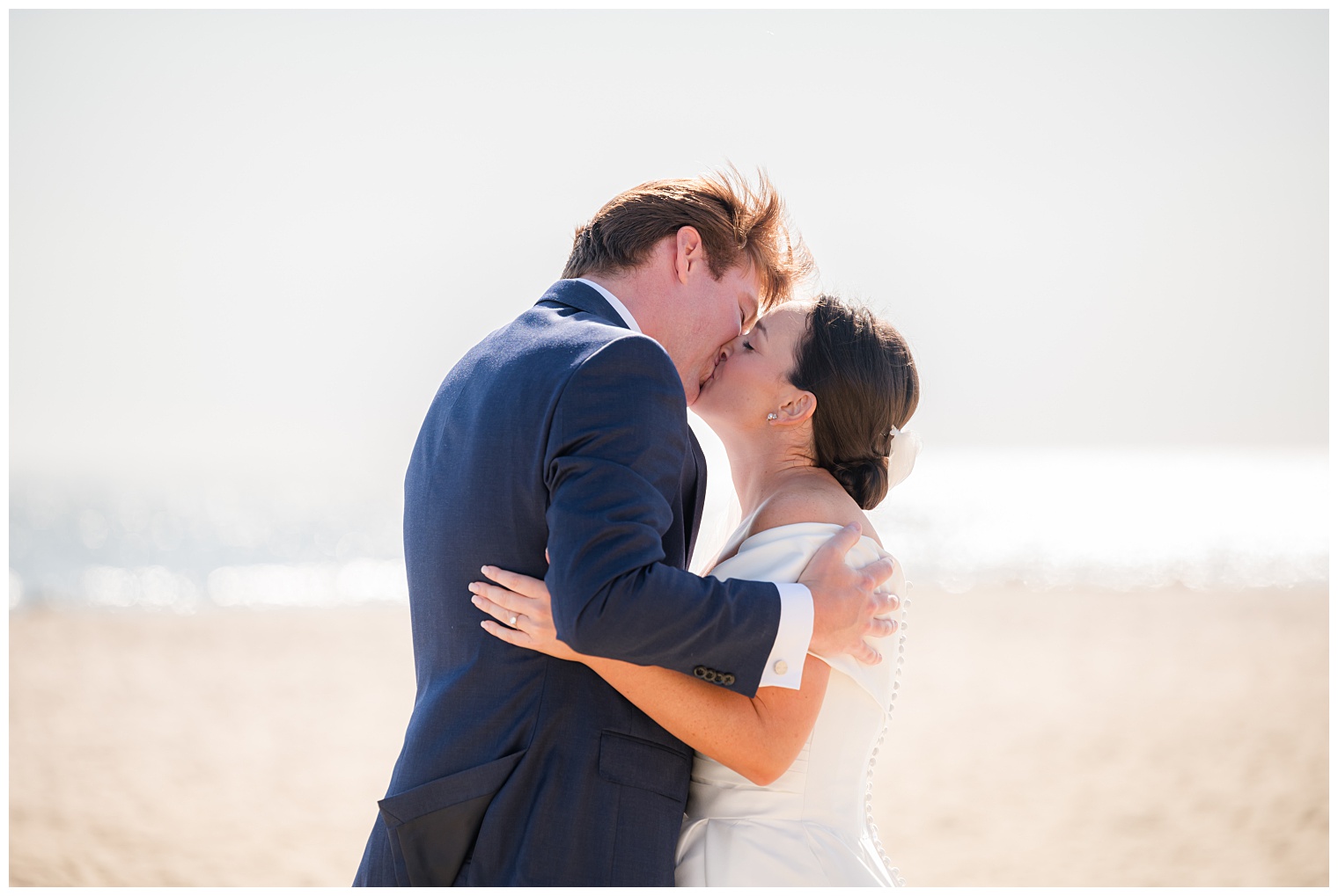 bride and groom kissing