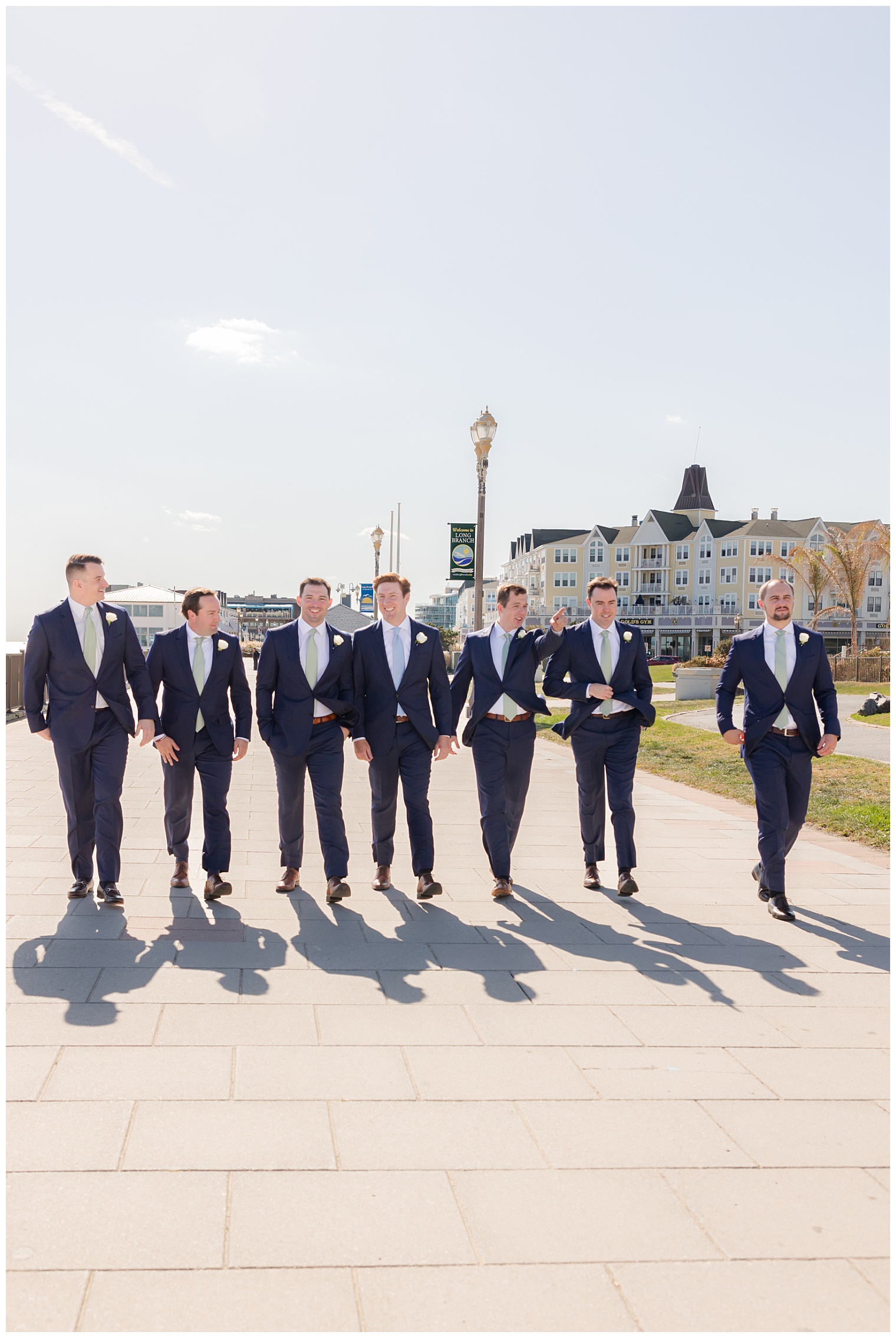 groom walking with his groomsmen