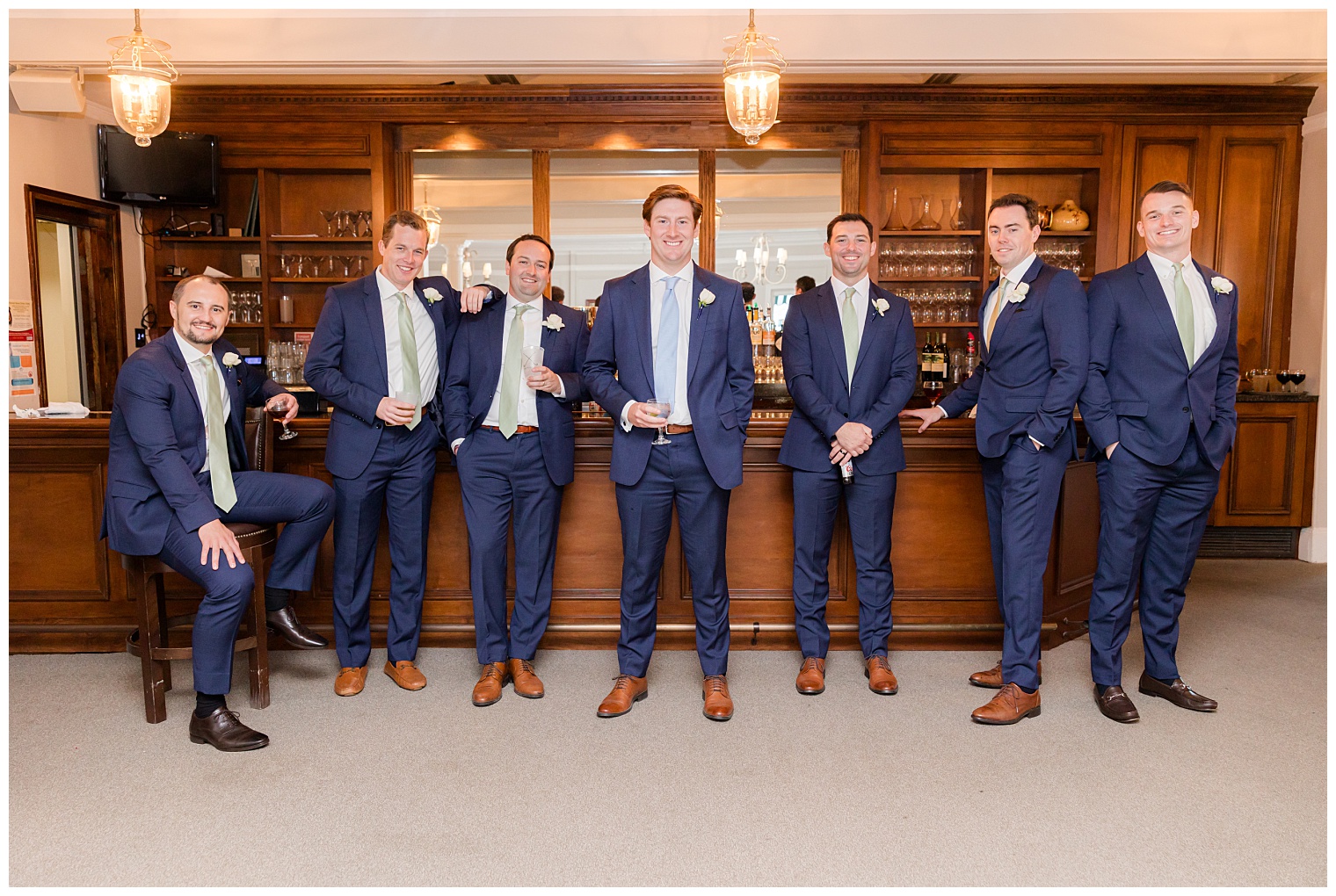 groom celebrating with his groomsmen