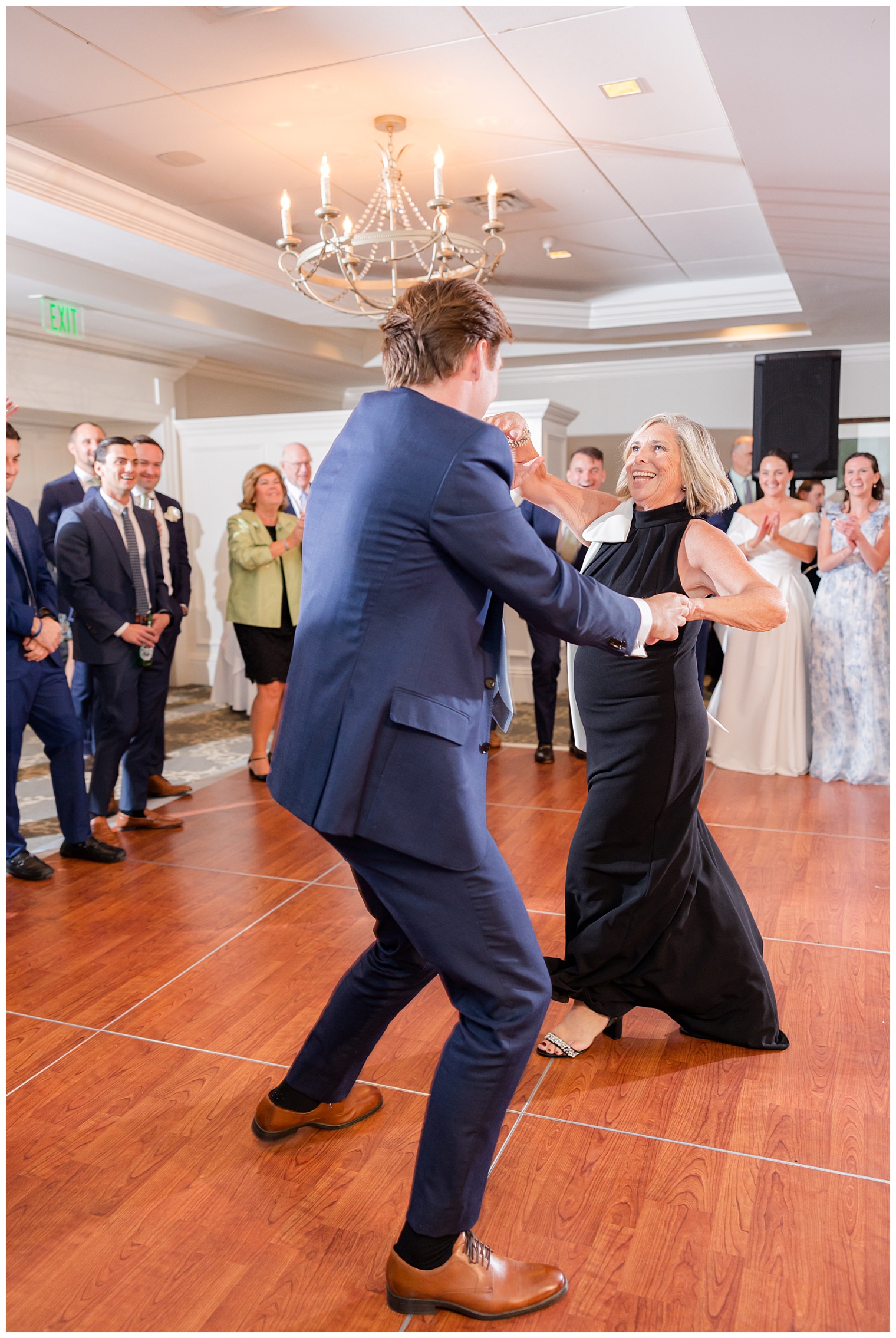 groom dancing with his mother