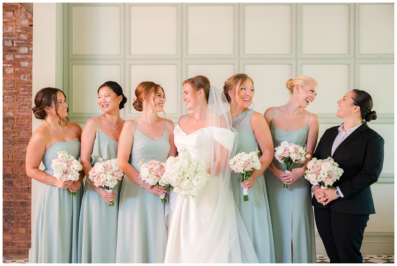 bride with her bridesmaids