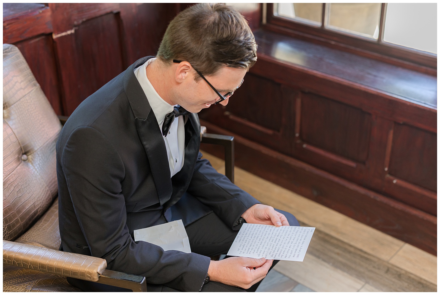 groom reading a letter