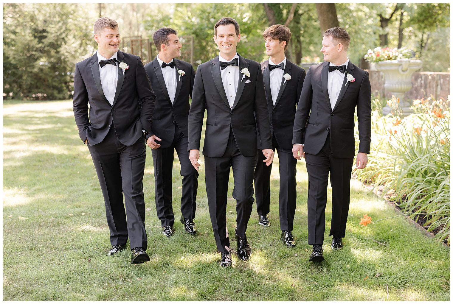 groom walking with his groomsmen