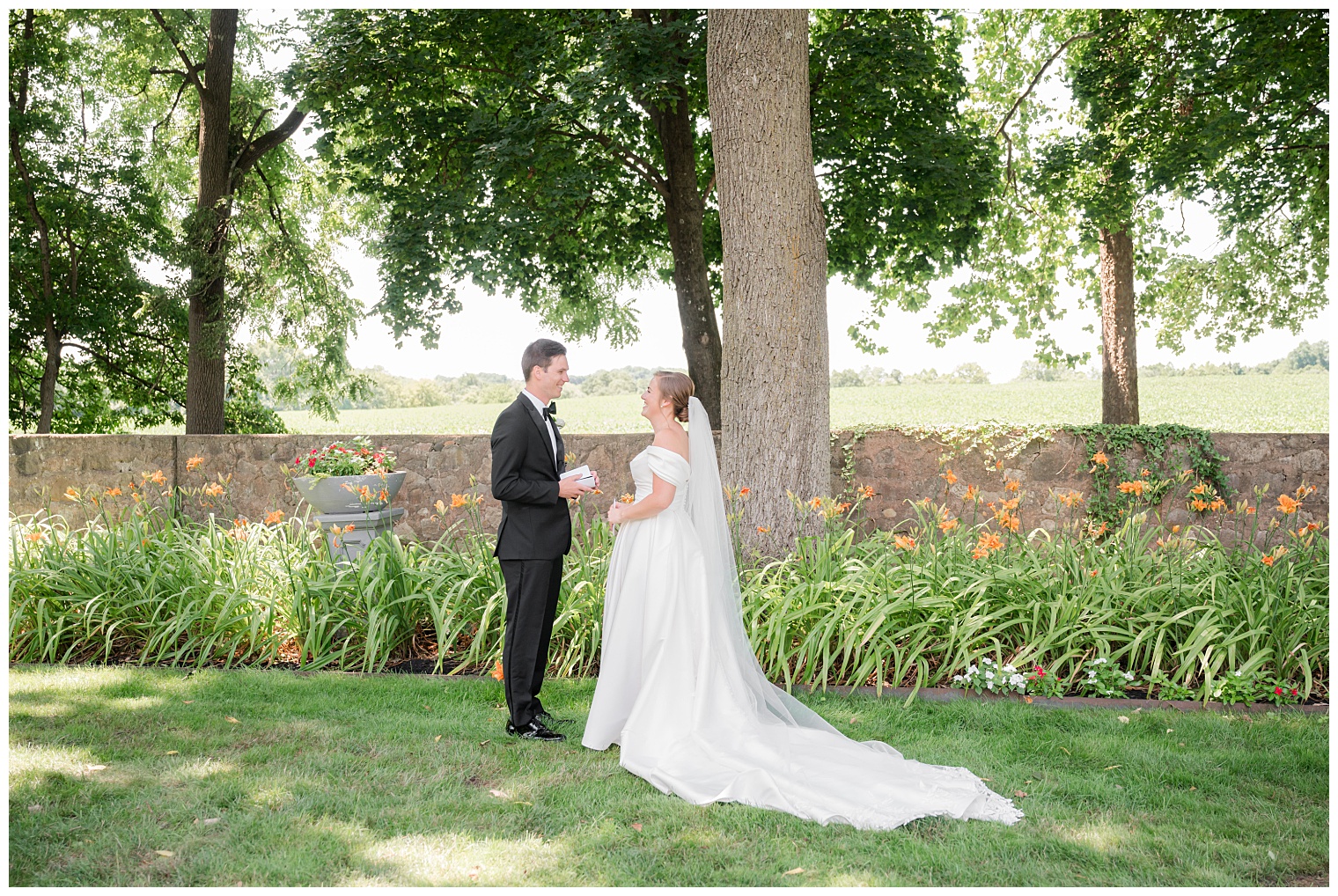 bride and groom reading their vows