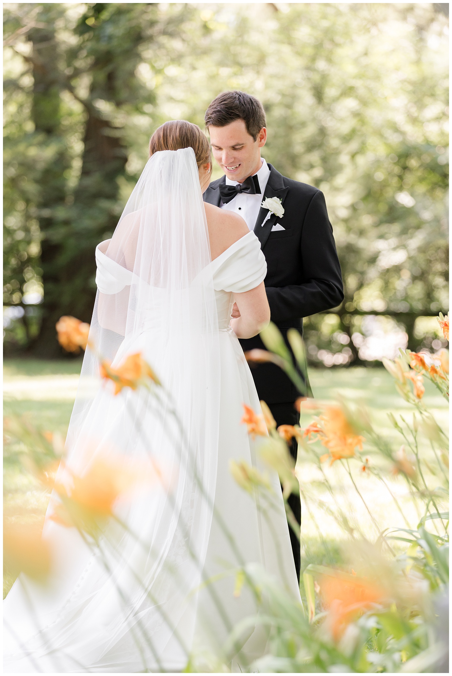 bride and groom reading their vows