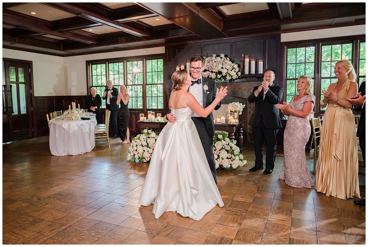 bride and groom entering the ballroom