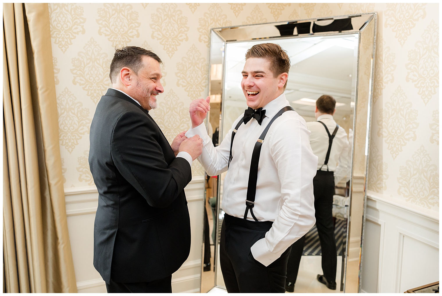 groomsman helping groom