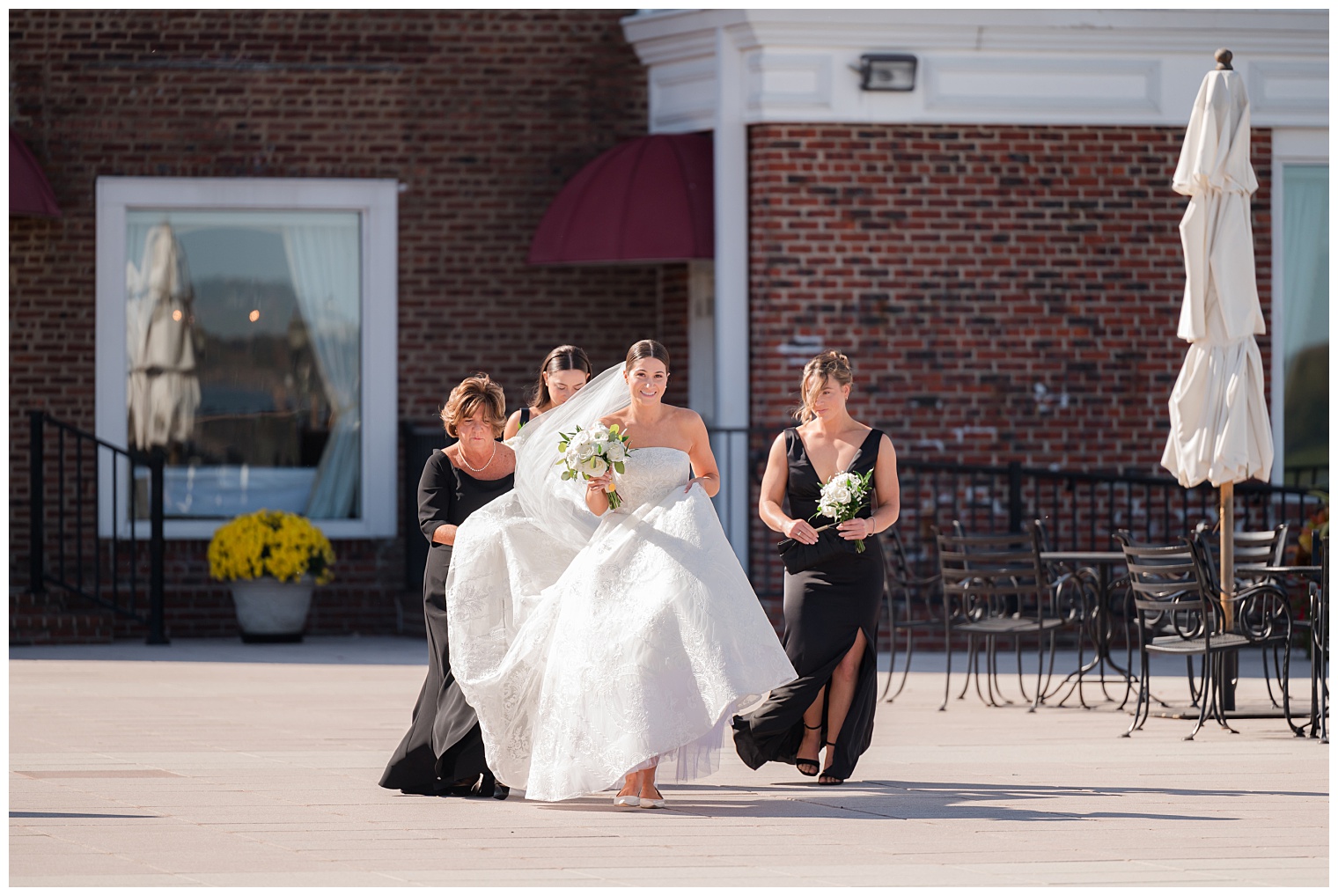 bride walking with her bridesmaids