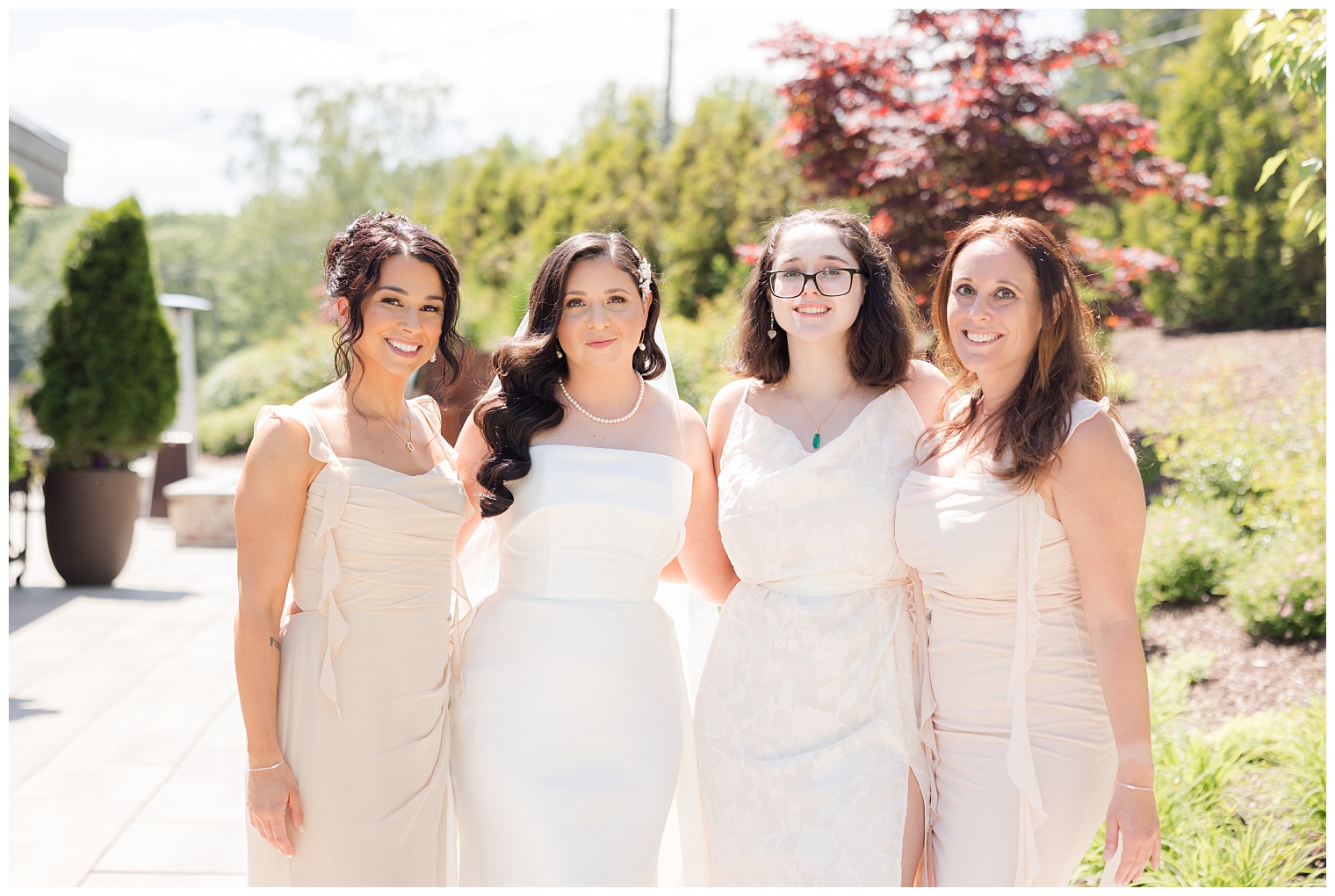 bride with her bridesmaids