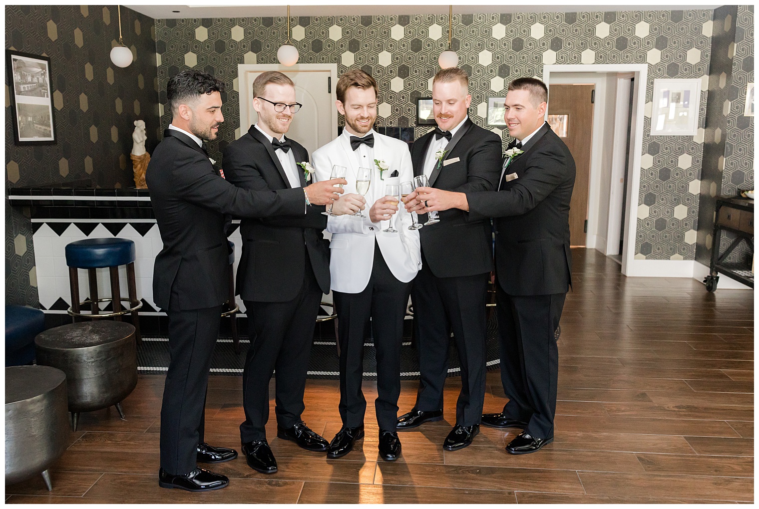 groom celebrating with his groomsmen