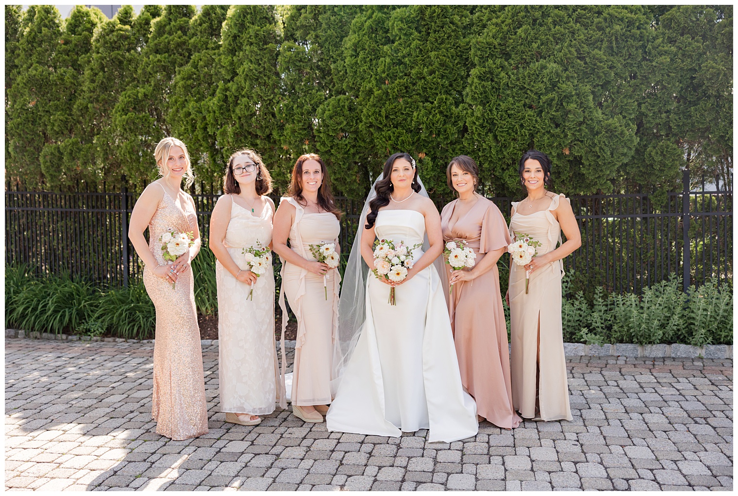 bride with her bridesmaids