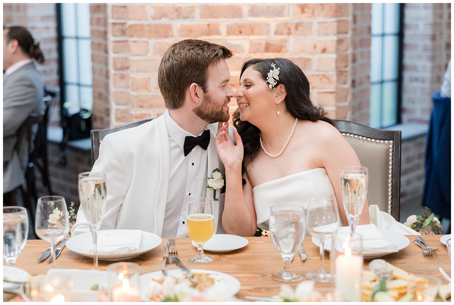 husband and wife at the sweetheart table