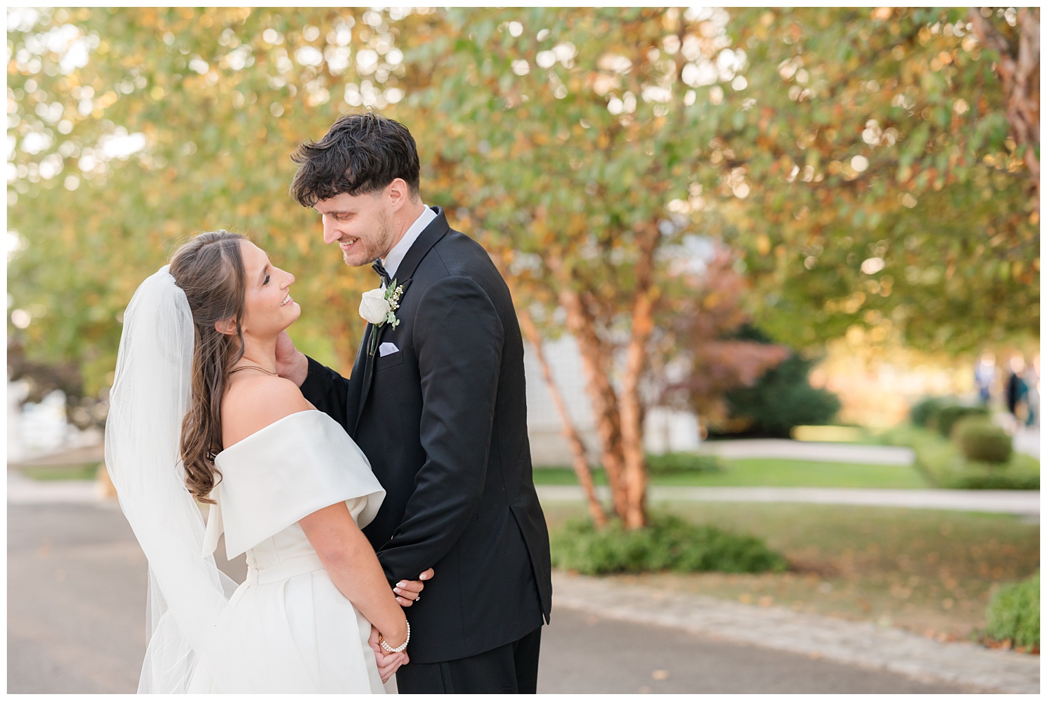 groom and bride looking at each other